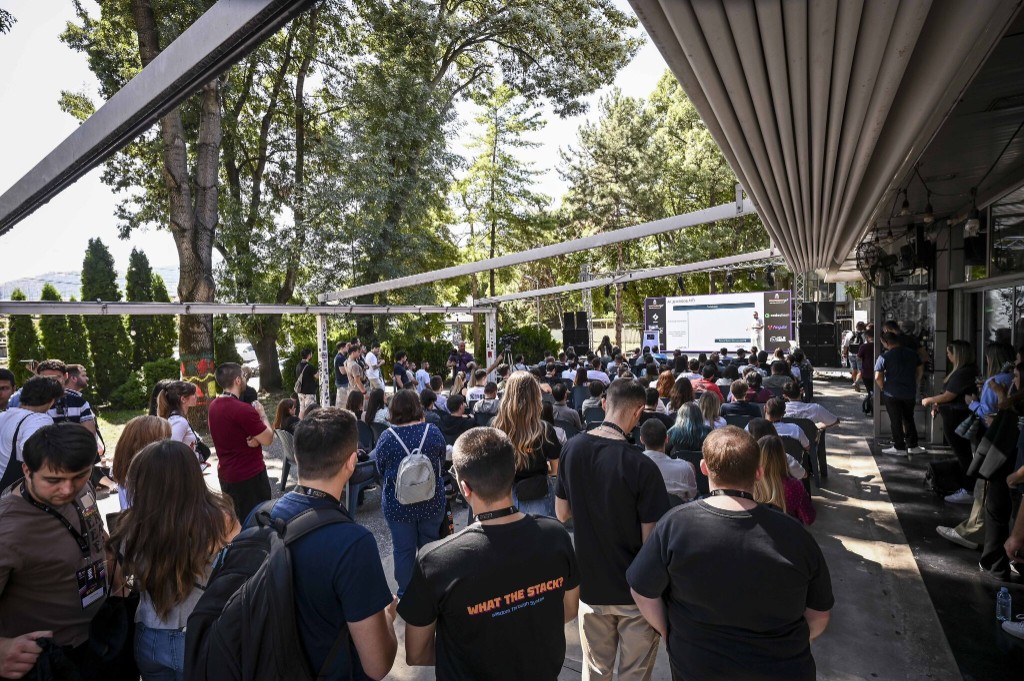 Large audience at AI training event - enterprise developers and technical professionals